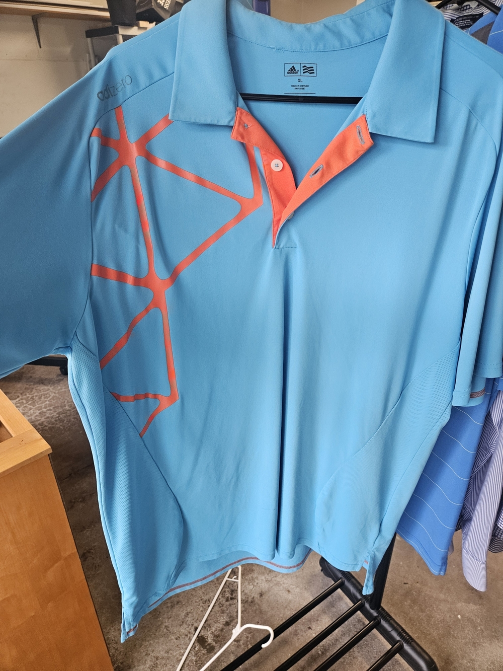 adidas Men’s Sky Blue Polo with Coral Accent